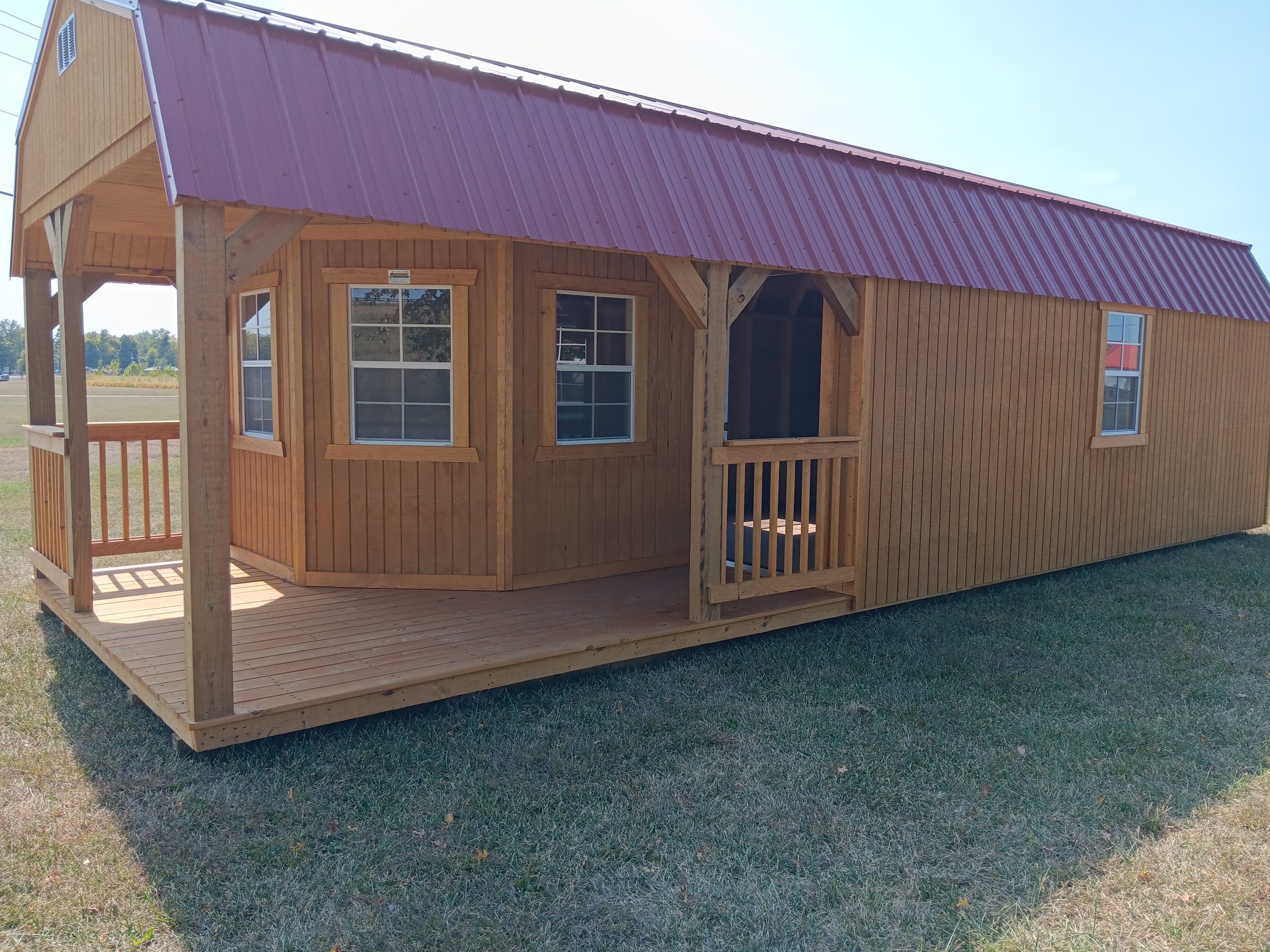 Wood cabin shell with covered porch
